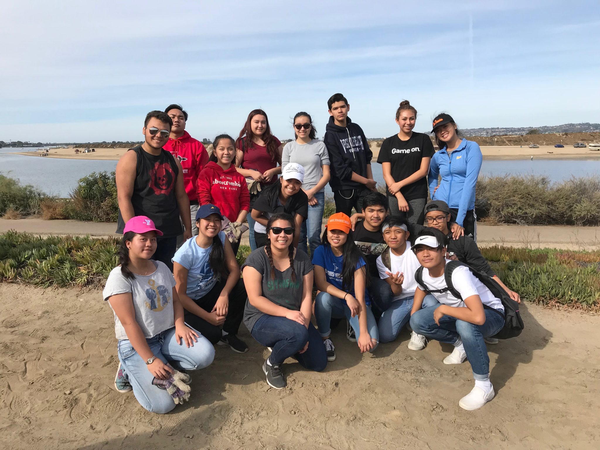 OCS Key Club members clean up the sand dunes near Mission Bay