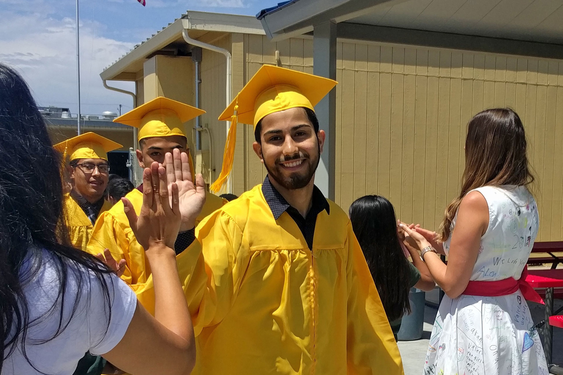 Brian Lizarraga graduates from O'Farrell Charter School