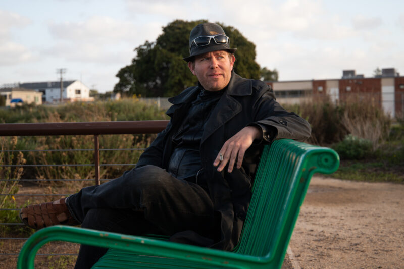 Chaun Reynolds, 41, sits near his home in Imperial Beach on Feb. 16, 2022.