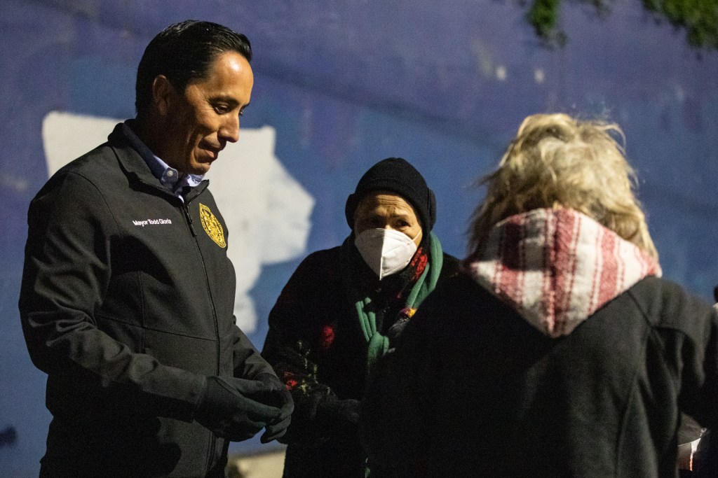Mayor Todd Gloria and Councilwoman Jen Campbell talk toElvida Elizalde, a homeless resident in the Ocean Beach area, while conductiing the Point-in-Time Count that surveys homeless individuals throughout the San Diego region on Feb. 24, 2022. / Photo by Adriana Heldiz