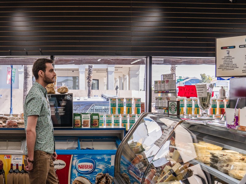Stephen Shepherd at Park Blvd Liquor & Deli waiting to order his lunch in University Heights on March 2, 2022.