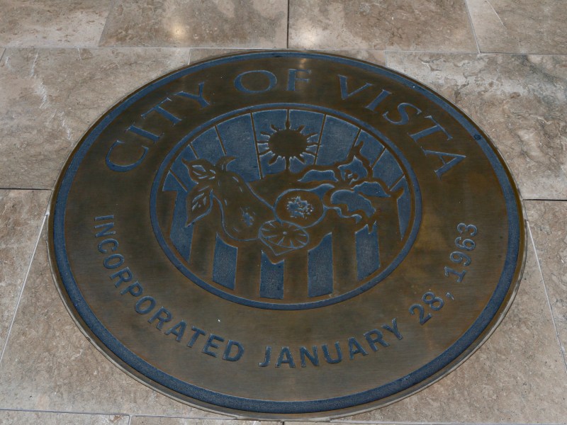 A floor plaque inside the Vista Civic Center, which serves as the city of Vista's City Hall. / Photo by Tigist Layne