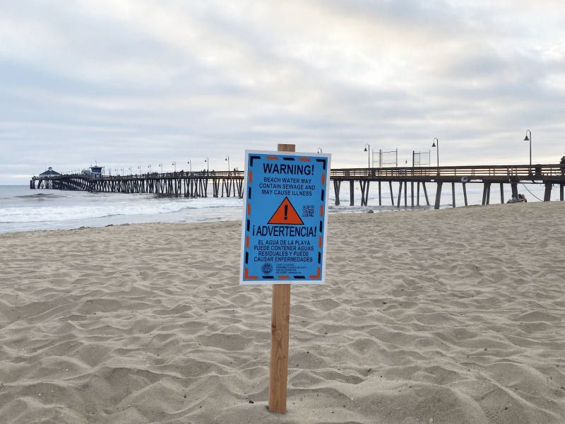 Beach warning signs at Imperial Beach on July 14, 2022