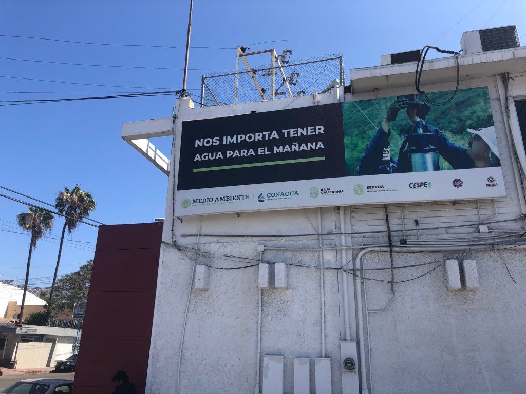 Sign outside Ensenada's state public services commission offices on July 1, 2022. It reads, "Having water for tomorrow is important to us." / MacKenzie Elmer
