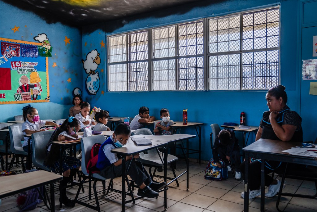 A 1st grade class at Guillermo González Camarena, primary school in the eastern part of Tijuana on Sept. 13, 2022. Most of the students are two years behind because of the pandemic. They have been learning letters and shapes.