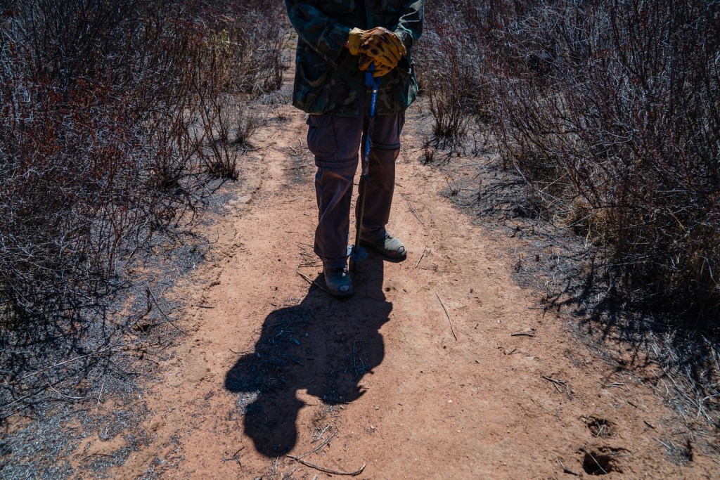John Carroll a resident who lives in the San Pasqual neighborhood in Escondido on Sept 25, 2022. Carroll says he can’t sit in his backyard because he can hear the constant gunfire.
