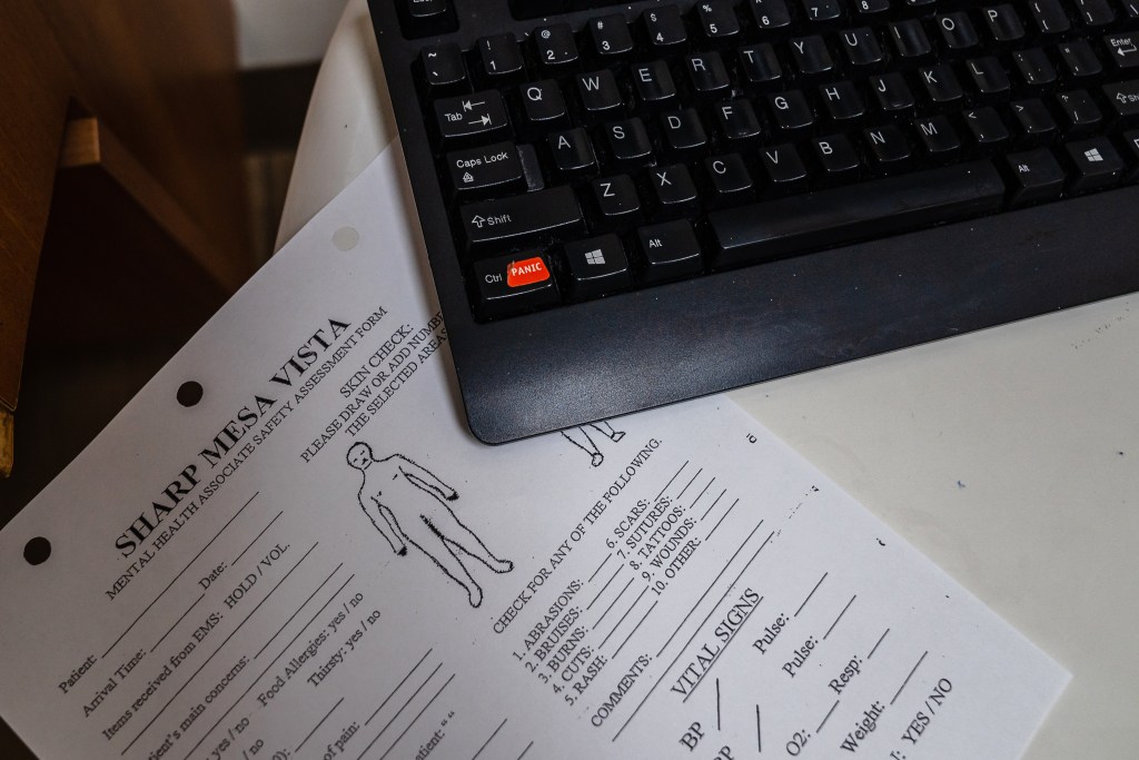 A safety assessment form in a medical examination room at Sharp Mesa Vista
