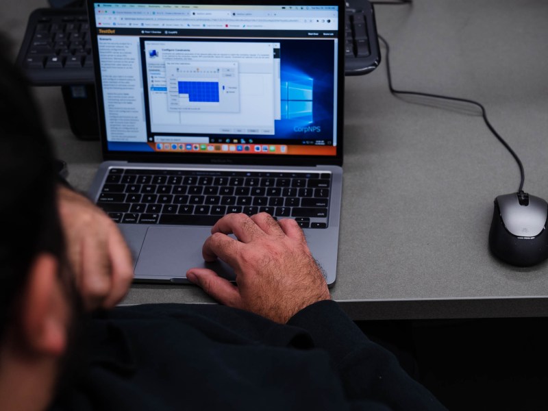 A student works on his computer during a cyber security class at San Diego City College on Nov. 29, 2022.