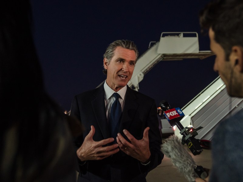 Gov. Gavin Newsom speaks to members of the media at the Marine Corps Air Station Miramar on Nov. 3, 2022.