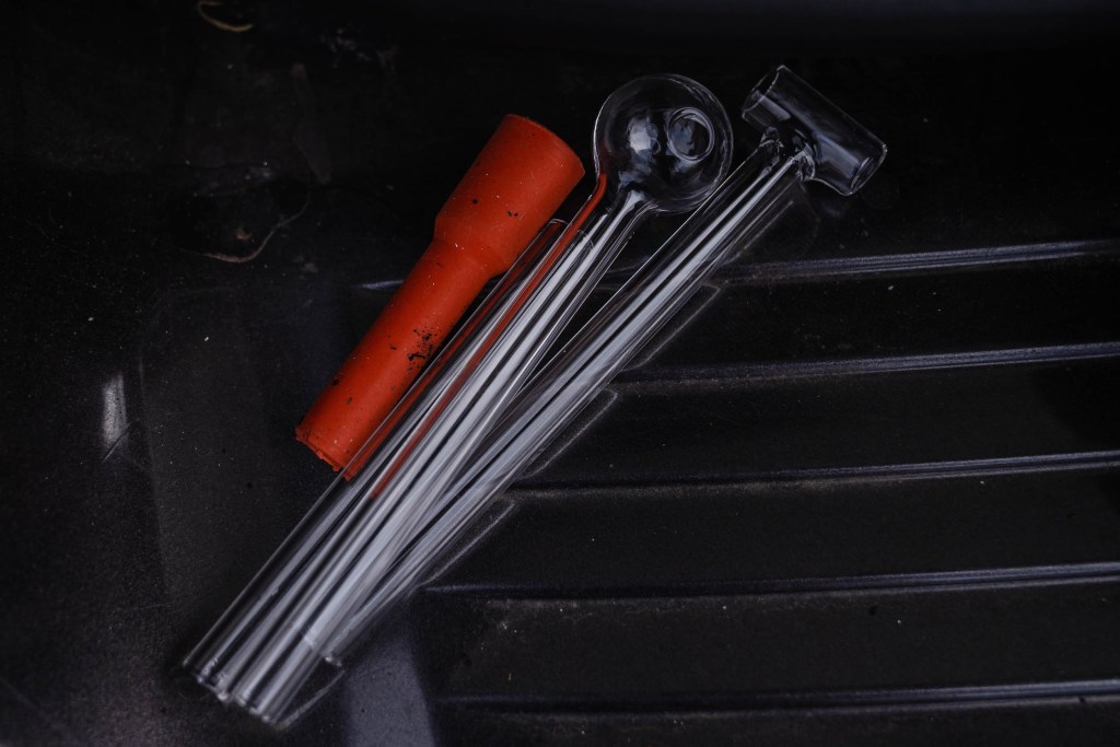 Two different glass pipes used for smoking crystal methamphetamine and heroin.