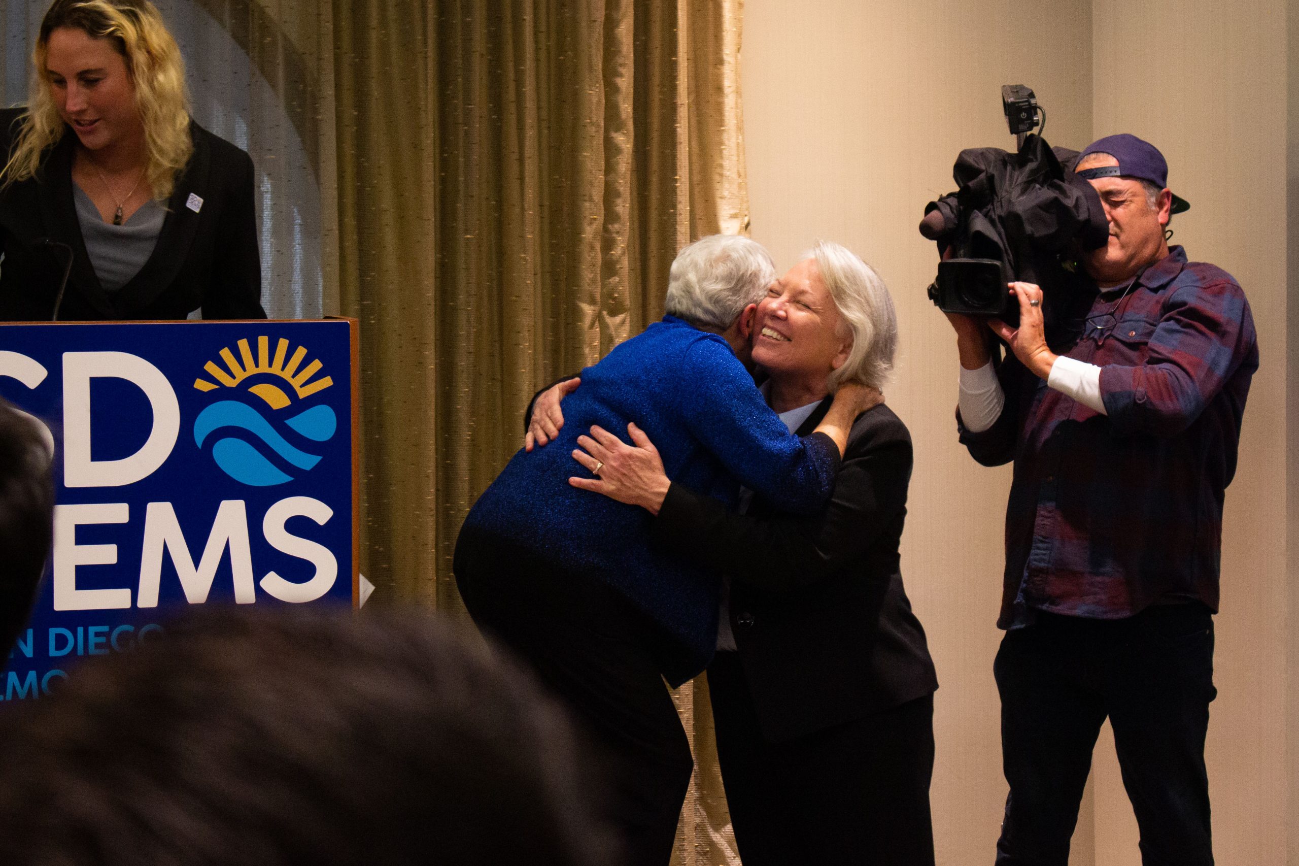 San Diego County Sheriff candidate Kelly Martinez hugs Councilwoman Jennifer Campbell at the Democrat election party held at the Westin Hotel in San Diego on Nov. 8, 2022. / Photo by Brittany Cruz-Fejeran for Voice of San Diego