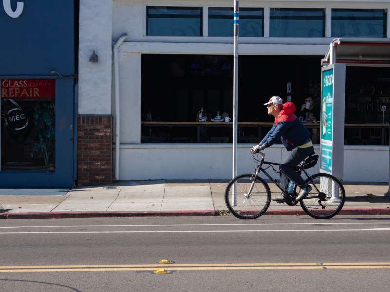 A bicyclist in North Park on Dec. 20, 2022.
