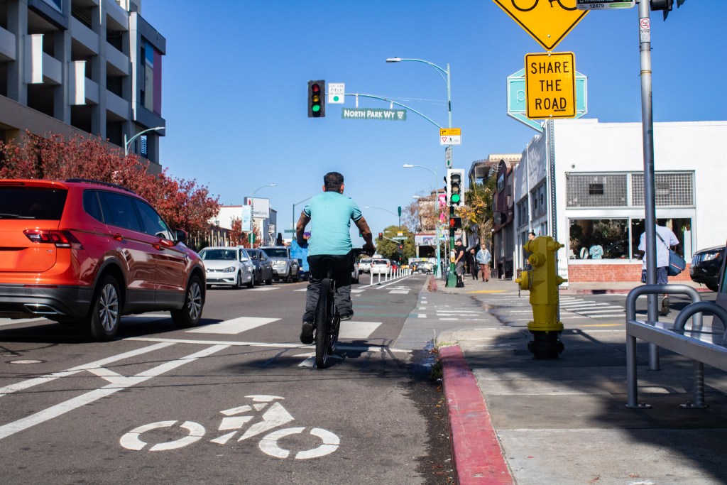 A bicyclist in North Park on Dec. 20, 2022.