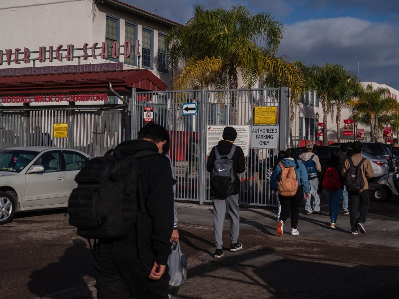 Students enter Hoover High School in City Heights on Nov. 29, 2022.