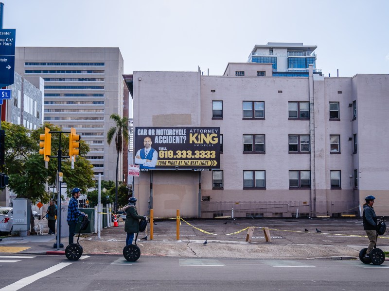 As the city tries to pursue a pilot safe campground for homeless seniors, it now appears most focused on a vacant parking lot at 4th Avenue and Beech Street in Cortez Hill. / Photo by Ariana Drehsler