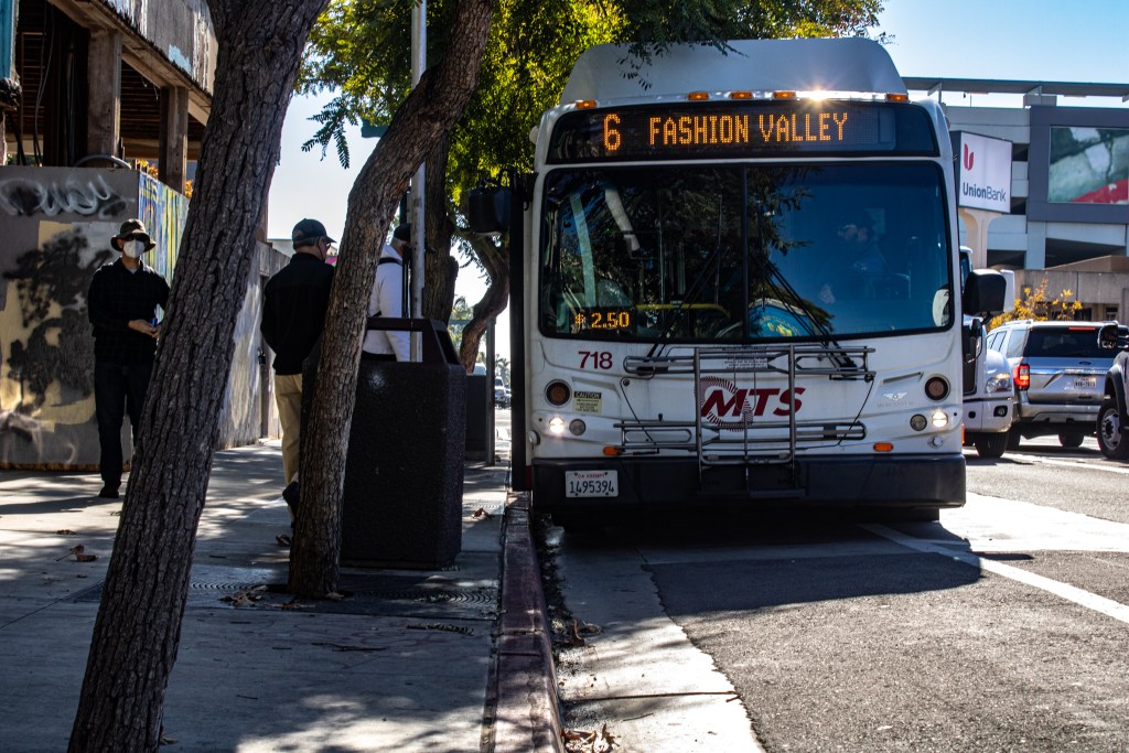 Metropolitan Transit System bus in North Park stops before heading towards University Fashion Valley on Dec. 20, 2022.