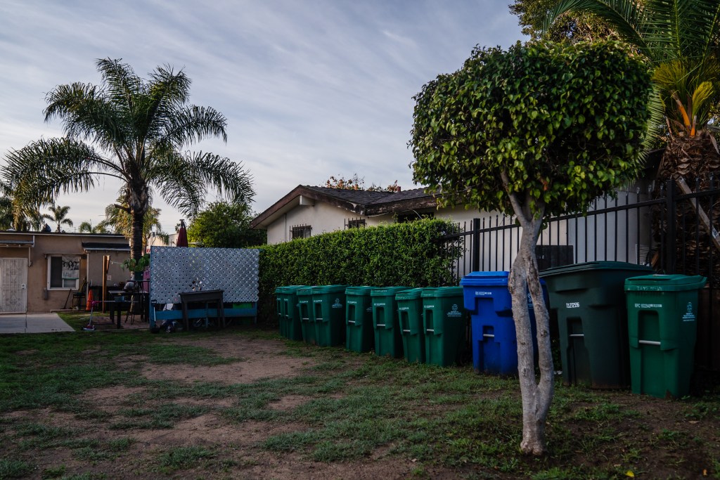 Recycle, new food waste bins are lined up on the grass in Grant Hill on Jan. 18, 2023.