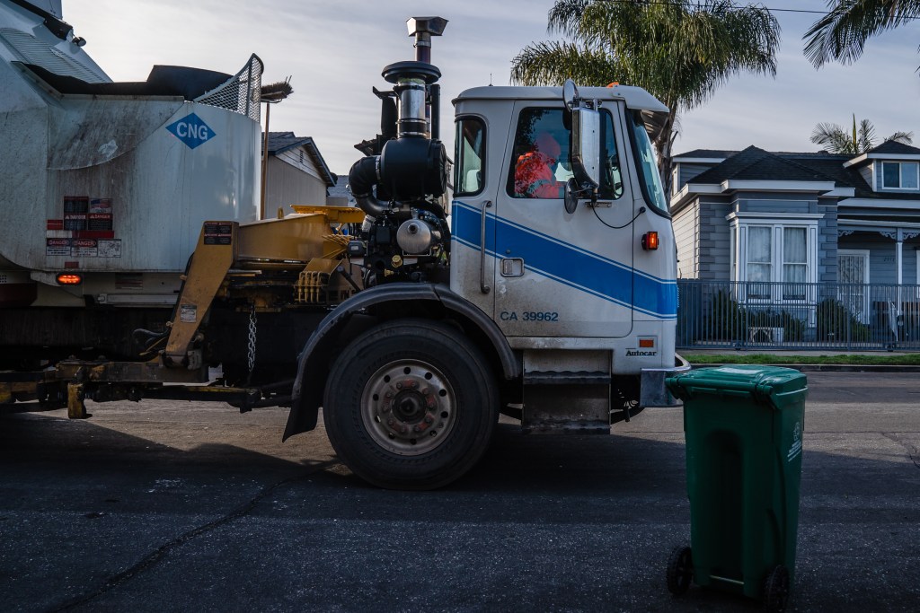 A new waste bin in front of a garbage truck in Grant Hill on Jan. 19, 2023.
