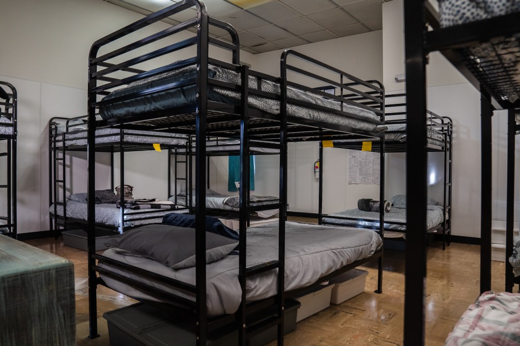 Beds at the Old Central Library that is now a shelter for women in downtown on Jan. 26, 2023. The new shelter has 36 beds and is being operated by NAMI San Diego. / Photo by Ariana Drehsler