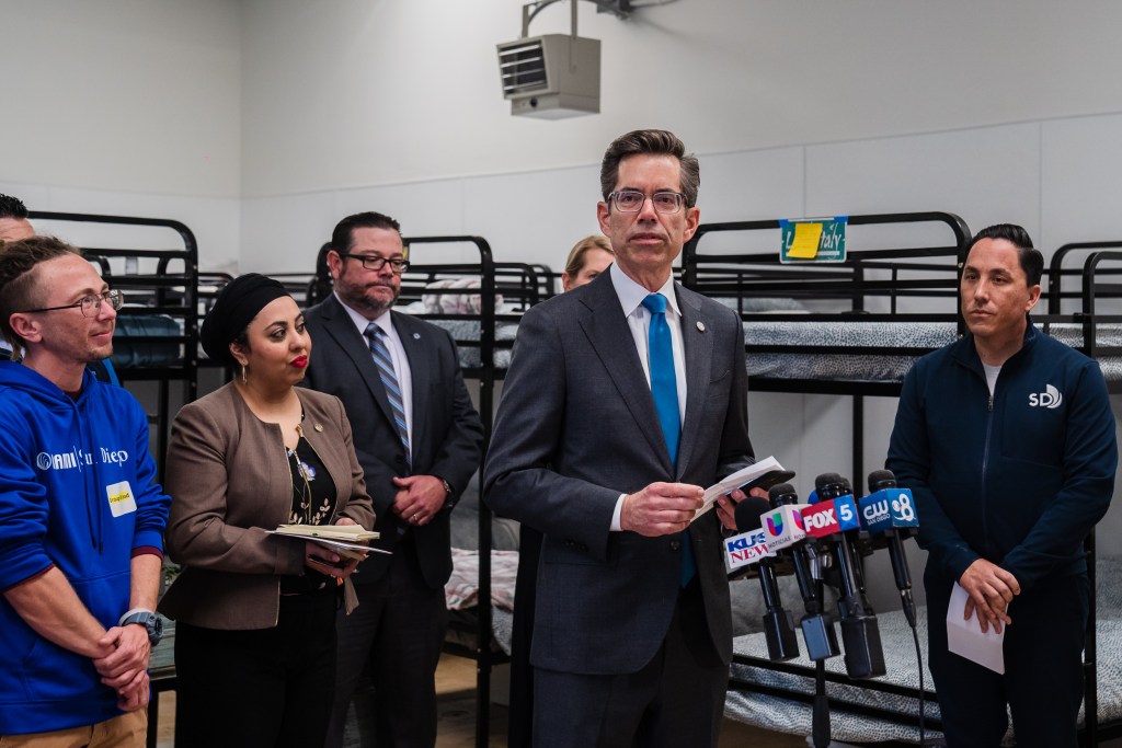 Councilmember Stephen Whitburn speaks to members of the press at the Old Central Library that has been converted into a new shelter for women in downtown on Jan. 26, 2023. The new shelter has 36 beds and is being operated by Imperial Counties under contract with the City’s Homeless Strategies and Solutions Department and National Alliance for Mental Illness of San Diego.