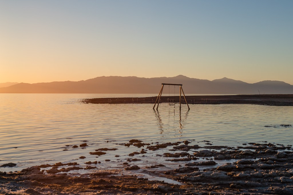 A swingset in the Salton Sea at Bombay Beach, Calif on Oct. 26, 2021.