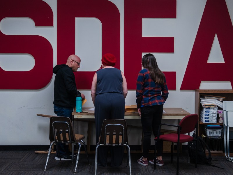 Members of the High Tech Education Collective count votes during a meeting at the San Diego Education Association on Feb. 2, 2023.