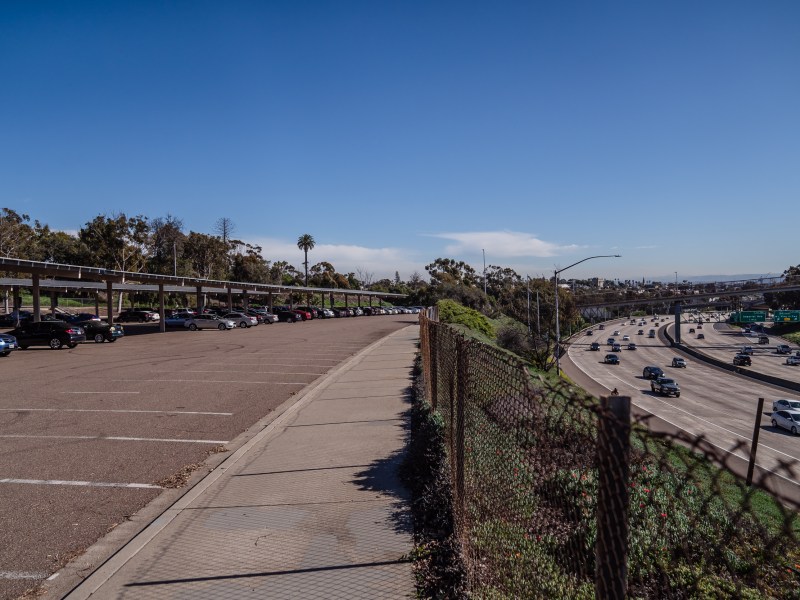 View of parking lot at Balboa Park's Inspiration Point next to the 5 Freeway on Feb. 3, 2023.