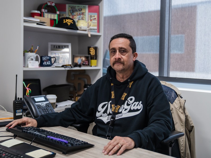 Head Counselor Juan "Wicho" Flores of the Logan Memorial Educational Campus sits in his office in Logan Heights on March 15, 2023.