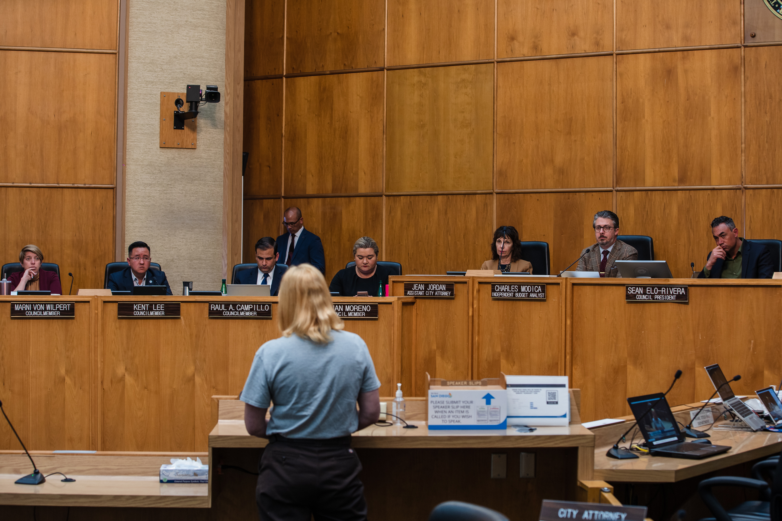 San Diego State student Maeve Howlett speaks about the proposed ban of homeless encampments during a city council meeting on April 10, 2023.