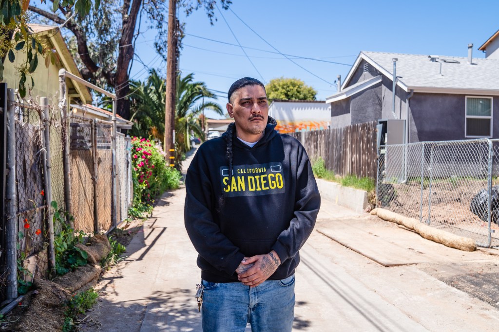 Cesar Tellez in the alley near the home he rents in Mountain View on Thursday, April 20, 2023. / Photo by Ariana Drehsler