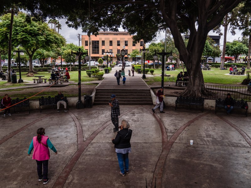 A woman sings at Parque Teniente Guerrero in Tijuana on May 31, 2023.