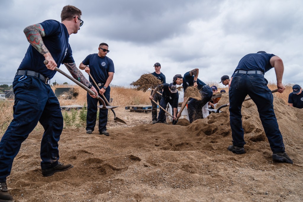 Firefighters at Fire Station 47 pack sandbags on Aug. 19, 2023 at Pacific Highlands Ranch.