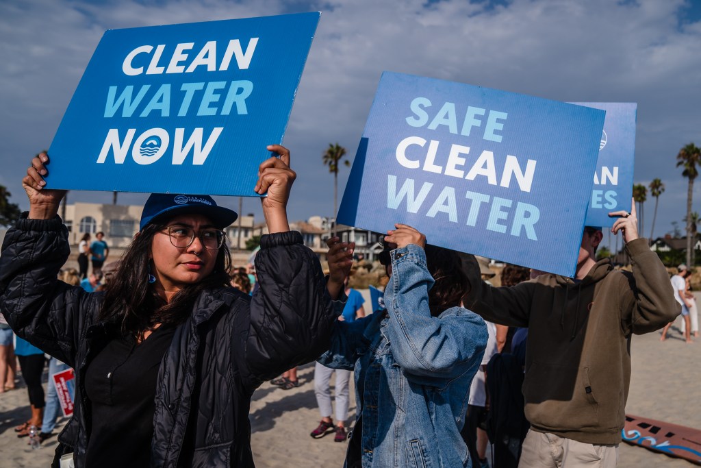 Protesters gathered for 'Stop The Sewage' rally at Central Beach in Coronado on Sept. 1, 2023.
