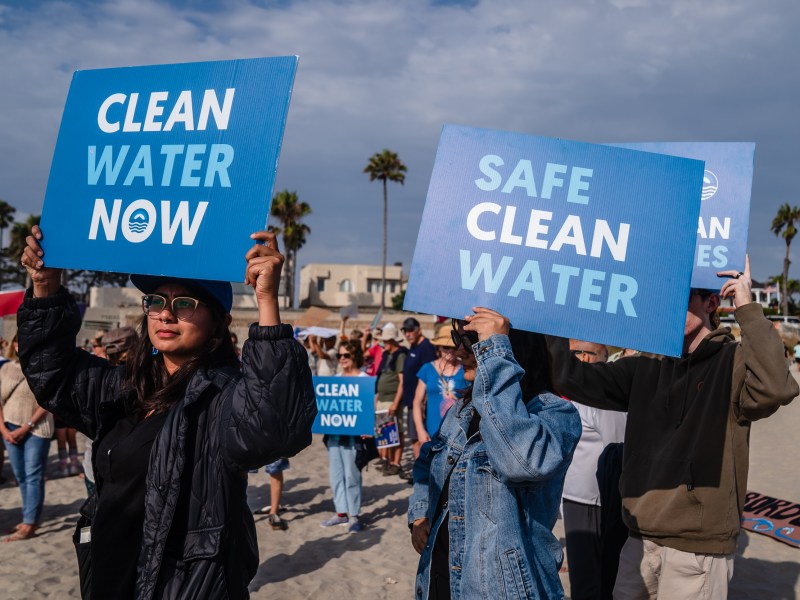 Protesters gathered for 'Stop The Sewage' rally at Central Beach in Coronado on Sept. 1, 2023.