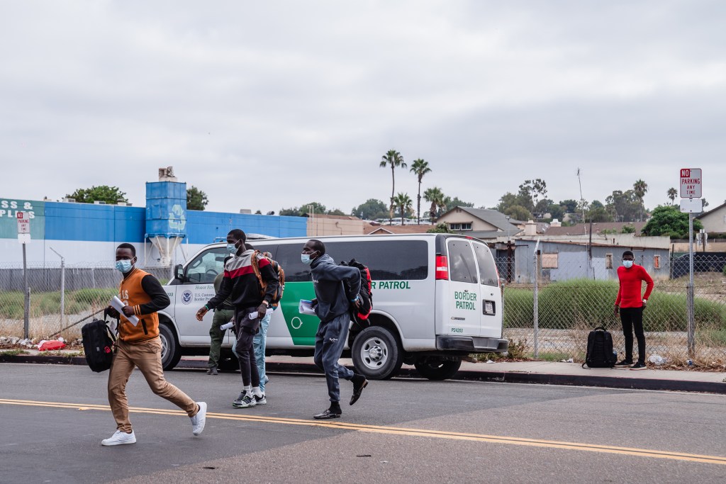 Asylum seekers dropped at off near the Iris Avenue Trolley Station in Otay Mesa on Sept. 14, 2023.