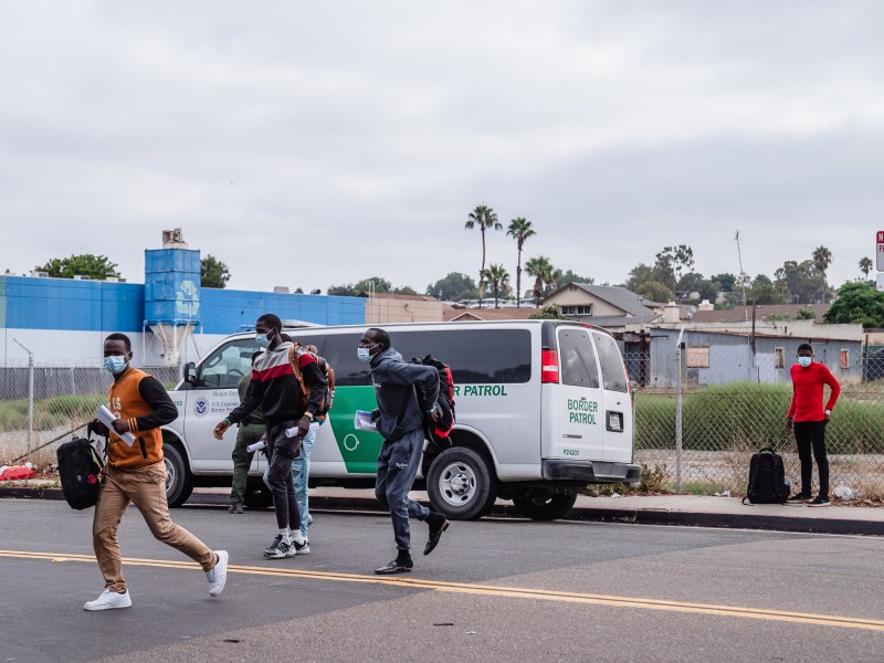 Asylum seekers dropped at off near the Iris Avenue Trolley Station in Otay Mesa on Sept. 14, 2023.