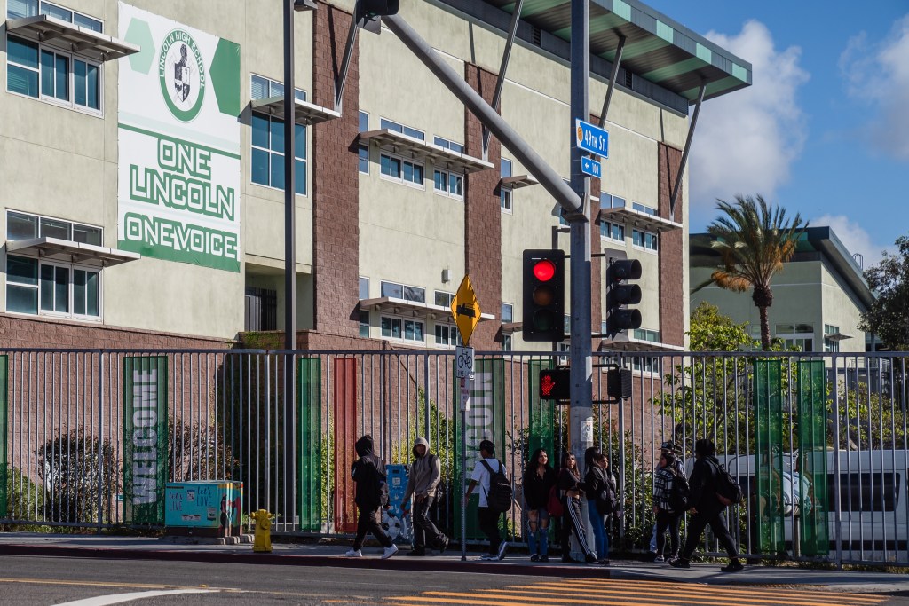 Students walk in front of Lincoln High School on Oct. 23 2023.