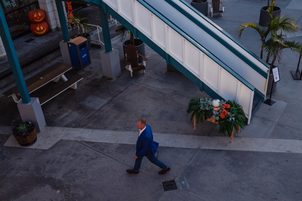 Larry Turner walking in Belmont Park before the Mission Beach Town Council meeting on Oct. 2, 2023.