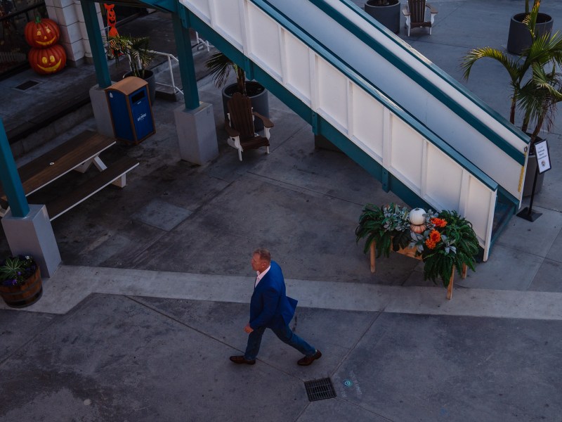 Larry Turner walking in Belmont Park before the Mission Beach Town Council meeting on Oct. 2, 2023.