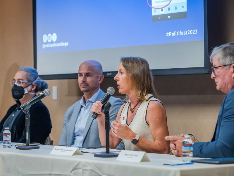 (Left to right) Ricardo Flores, executive director of Local Initiatives Support Corporation San Diego, Coronado Mayor Richard Bailey, State Senator Catherine Blakespear and Encinitas Mayor Tony Kranz speak at the University of San Diego for Politifest 2023 on Saturday, Oct. 7, 2023. / Vito Di Stefano for Voice of San Diego