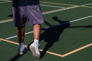 A man plays pickleball at San Diego Pickelball at the Mission Bay Resort On Nov. 28, 2023.