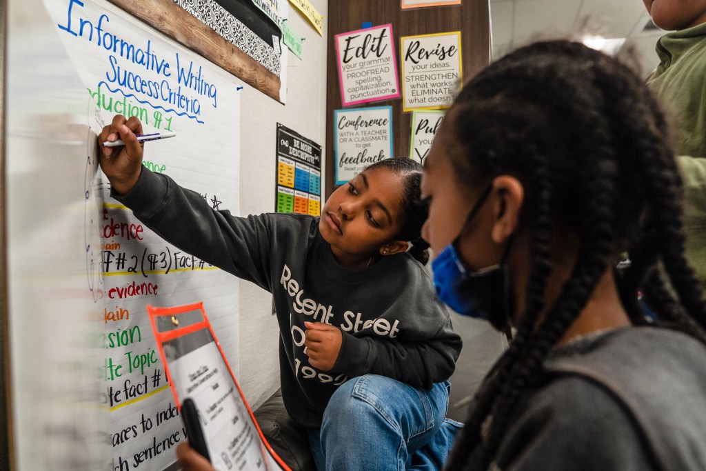 Third graders work on a class assignment at Fahari L. Jeffers Elementary School in Chula Vista on Nov. 7, 2023.