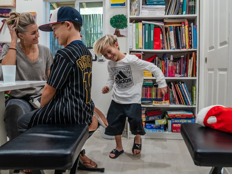 Sara Shields with her son Owen during a Virtues and Detachment lesson in Vista on Dec. 5, 2023.