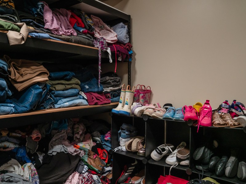 A closet with donated and bought items at Interfaith’s Hawthorne Veteran and Family Resource Center in Escondido on Thursday, Aug. 1, 2024. / Ariana Drehsler for Voice of San Diego