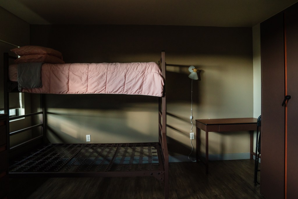 A room showing beds for a family that is not being used at Interfaith’s Hawthorne Veteran and Family Resource Center in Escondido on Thursday, Aug. 1, 2024. / Ariana Drehsler for Voice of San Diego