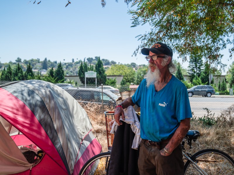 Tommy Rodgers, 65, at a homeless encampment in Lemon Grove on Wednesday, July 31, 2024, where he’s been staying for a month. Rodgers from El Cajon lost his home in 2009. / Ariana Drehsler for Voice of San Diego
