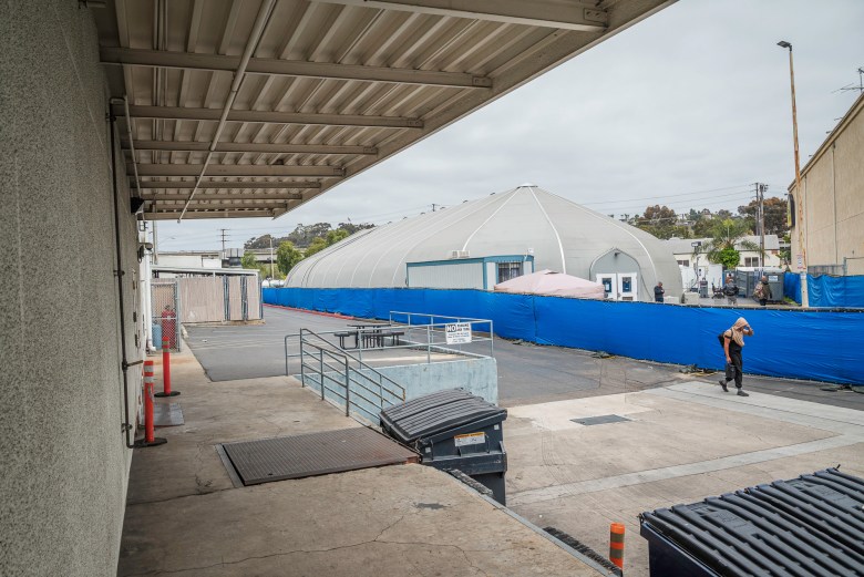 A homeless shelter in Midway next to the County Health Services Complex on April 15, 2025. / Vito di Stefano for Voice of San Diego