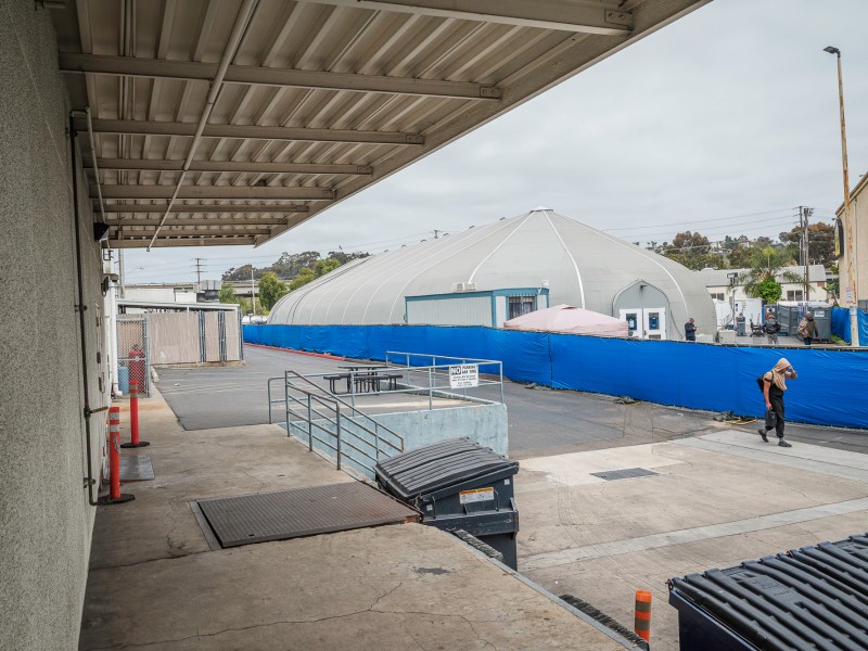 A homeless shelter in Midway next to the County Health Services Complex on April 15, 2025. / Vito di Stefano for Voice of San Diego