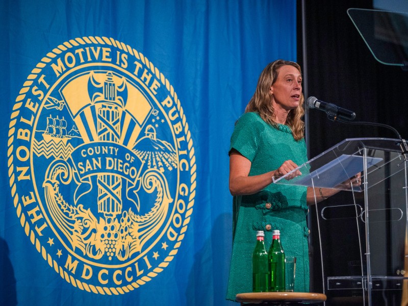 San Diego County Supervisor Terra Lawson-Remer delivers the State of the County speech at the National History Museum, in Balboa Park on April 16, 2025. / Photo by Vito di Stefano for Voice of San Diego