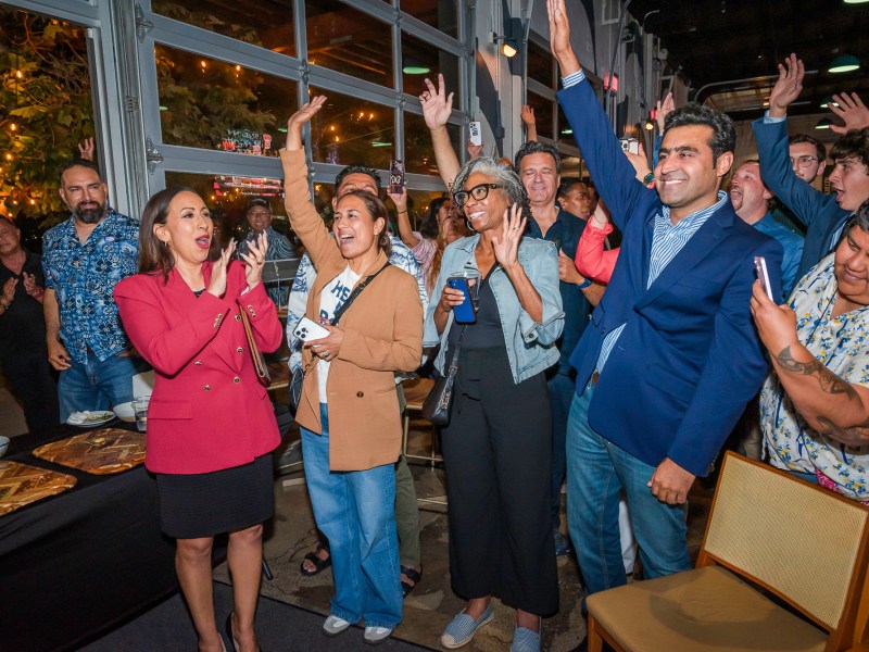 Imperial Beach Mayor Paloma Aguirre and supporters cheer early results on Tuesday, July 1, 2025, at Novo Brazil Brewery. She had a six-point lead ahead of her opponent, Chula Vista Mayor John McCann, as of 10 p.m. / Photo by Vito di Stefano